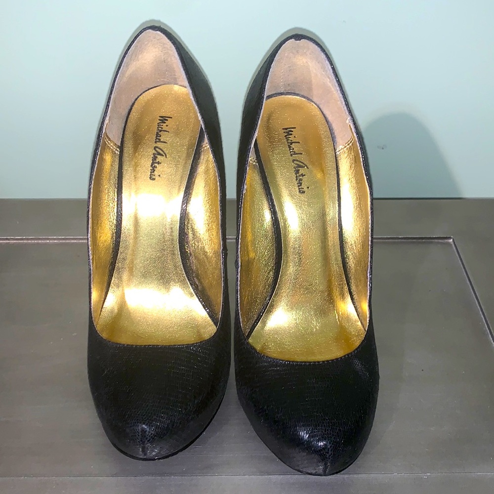 Gently worn black pumps